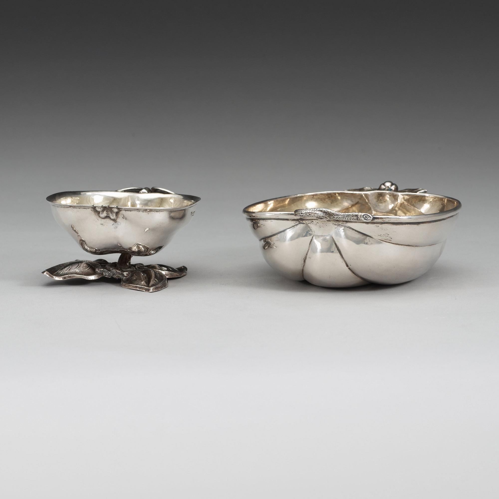 Two Russian mid 19th century parcel-gilt dishes, marked Carl Ekqvist, S:t Petersburg and unidentified maker, Moscow.