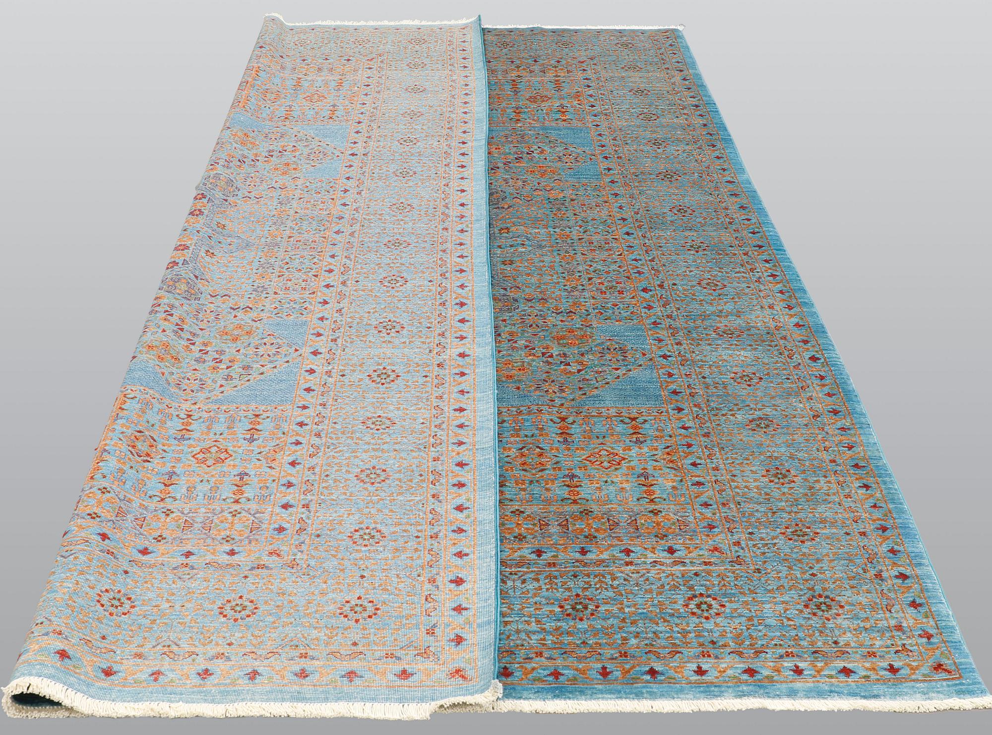 An oriental carpet with a Mamluk pattern, ca 299 x 210 cm.