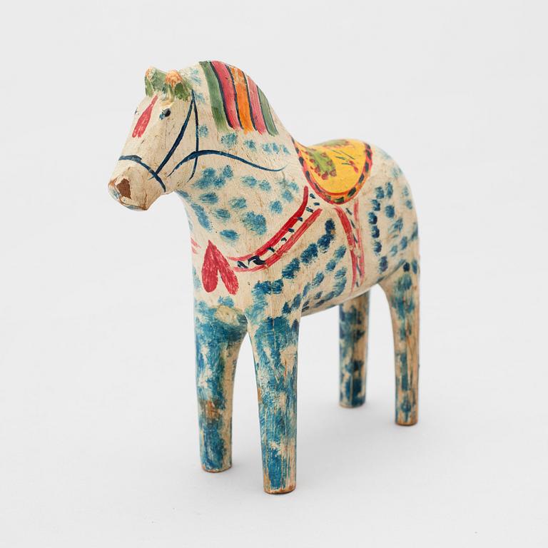 A painted folk art dala horse first half of the 20th century.