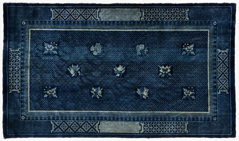 An antique Baotou carpet, north China, c. 257 x 155 cm.