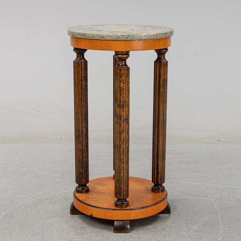 A stone top pedestal, 1920's/30's.