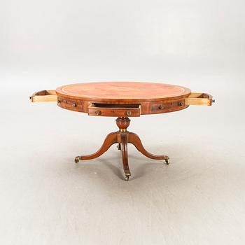 An English mahogany and leather drumtable mid 1900s.