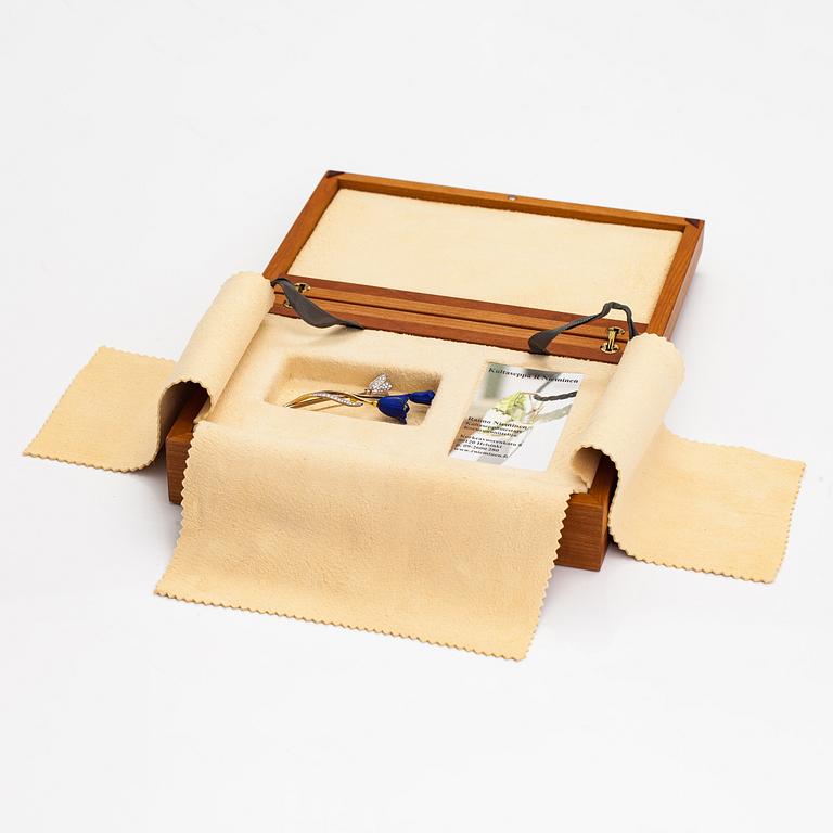 Raimo Nieminen, Brosch "Valonkukka", 18K gult. grönt och vitt guld, diamanter ca 1.40 cy och skuren lapis lazuli. 2005.