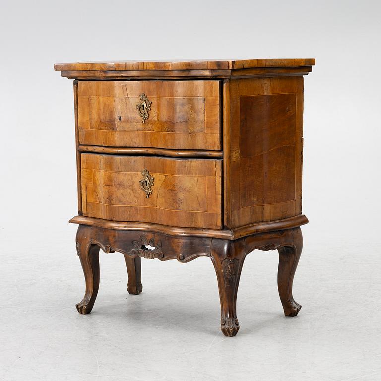 A small neo-Rococo chest of drawers, 19th century.