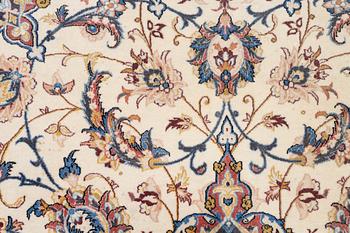 An Isfahan carpet, signed, approx. 372 x 255 cm.