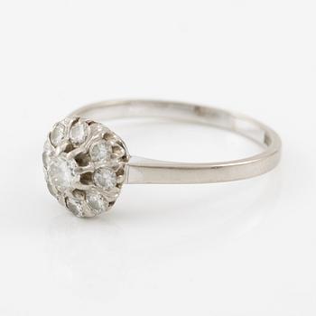 A ring and a pair of earrings in 18K white gold set with round brilliant-cut and octagonal-cut diamonds.