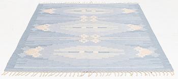 Ingegerd Silow, a carpet, c 235 x 166 cm, signed IS.