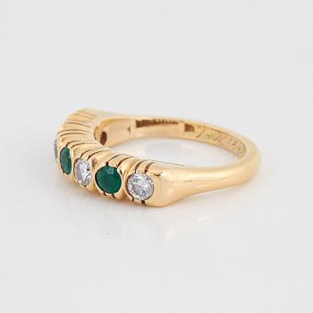 Elon Arenhill, ring with diamond and emeralds.