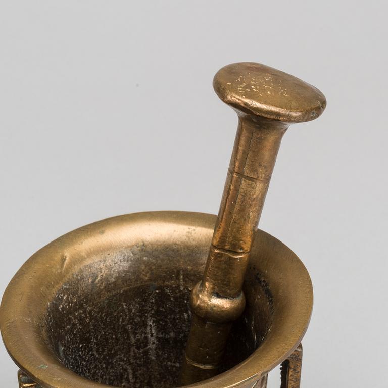 Two brass mortar and pestle.