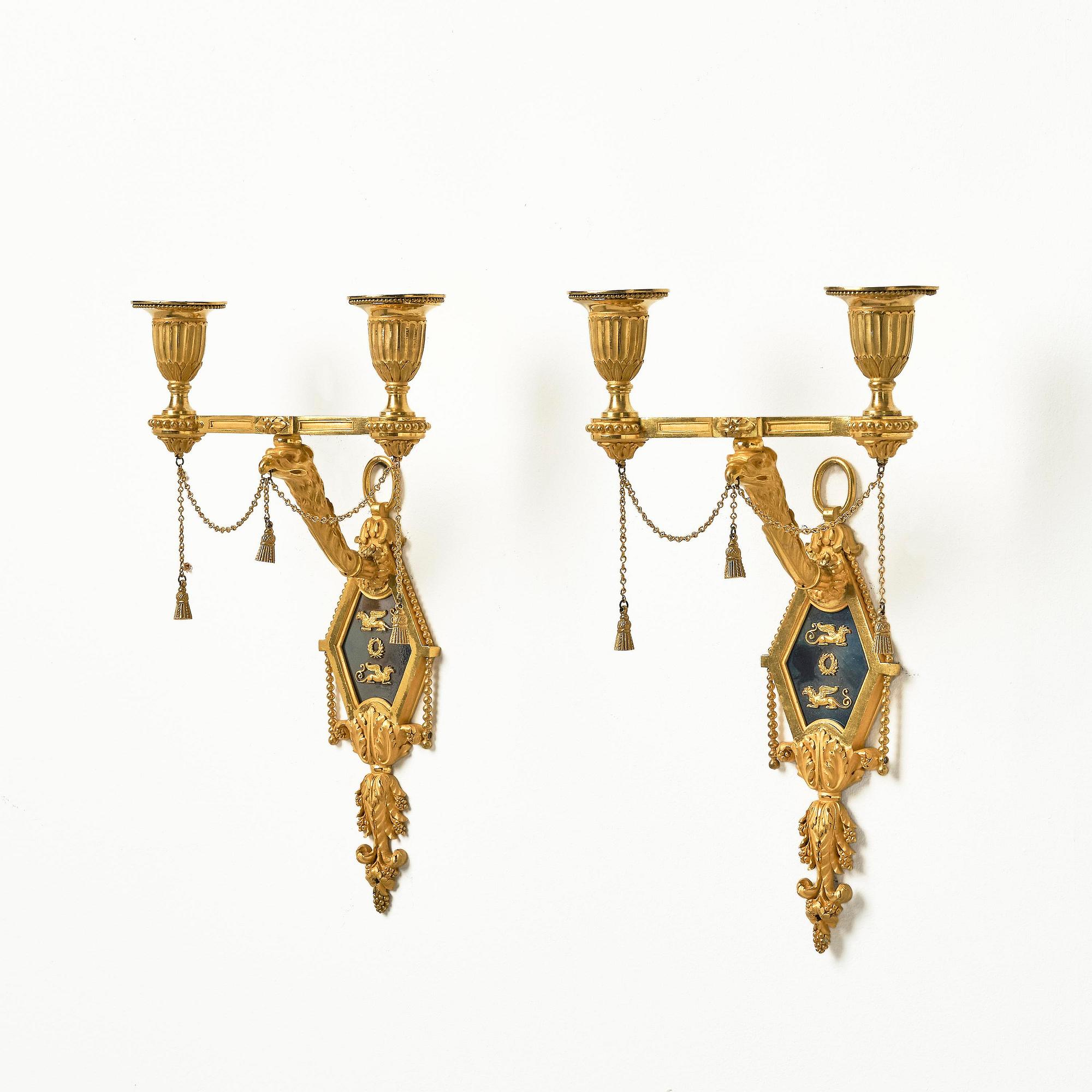 A pair of two-branch late Louis XVI ormolu and blued steel appliques attr. to F. Rémond (bronzier in Paris 1774-1812).