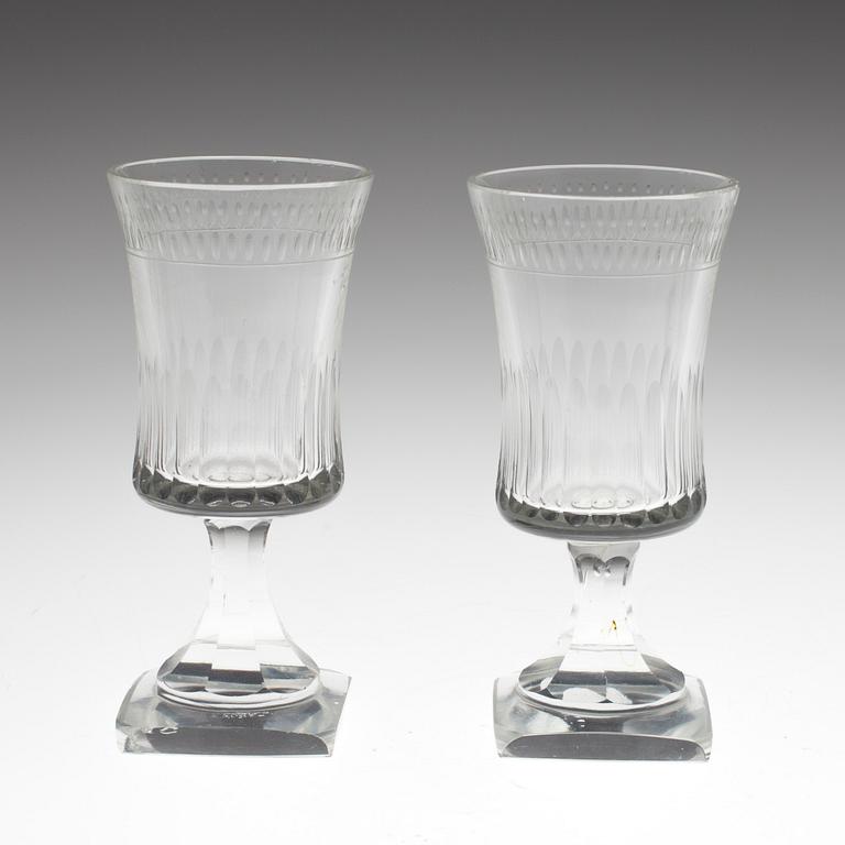 A SET OF TENN WINE GLASSES.