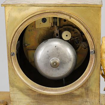 An Empire mantel clock, beginning of the 19th ct.