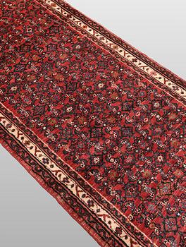 A Hosseinabad runner carpet, 500 x 93 cm.