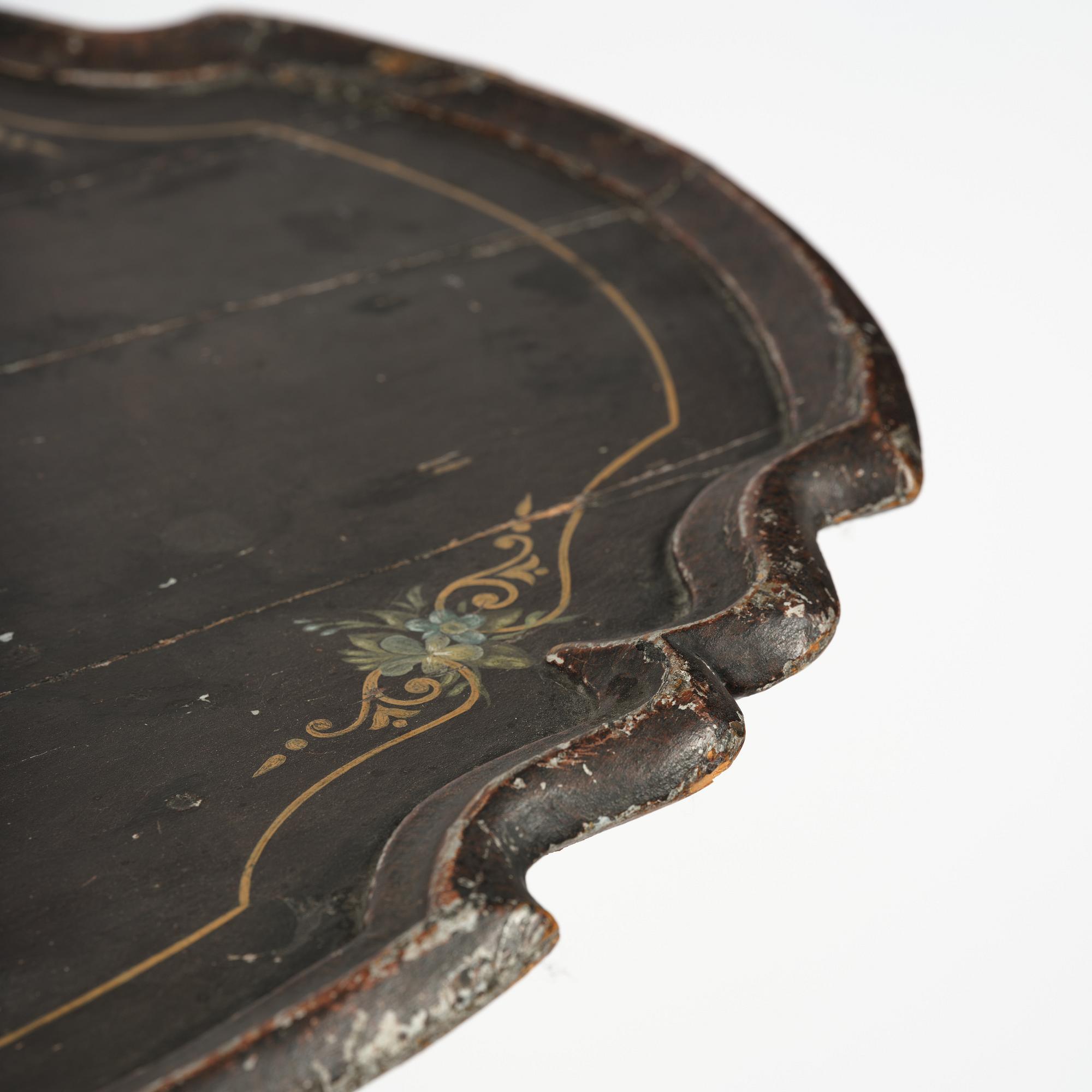 A Swedish late baroque japanned tilt-top tea table, mid 18th century.