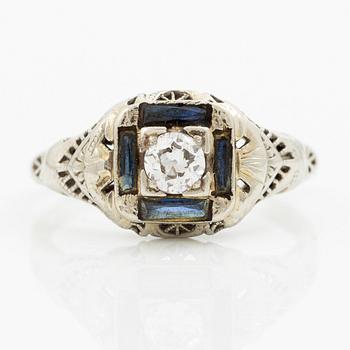 Ring, 18K white gold set with an old-cut diamond and blue stones.