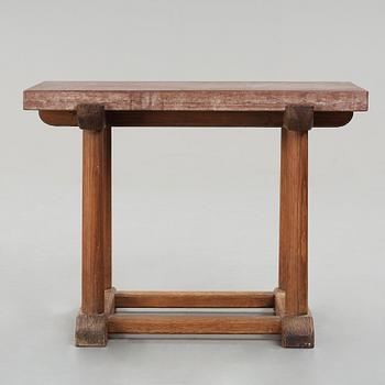 Axel Einar Hjorth, a red limestone top and stained pine side table, Nordiska Kompaniet, Sweden 1929.