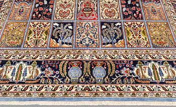 A Figural Sarouk carpet, c. 348 x 240 cm.