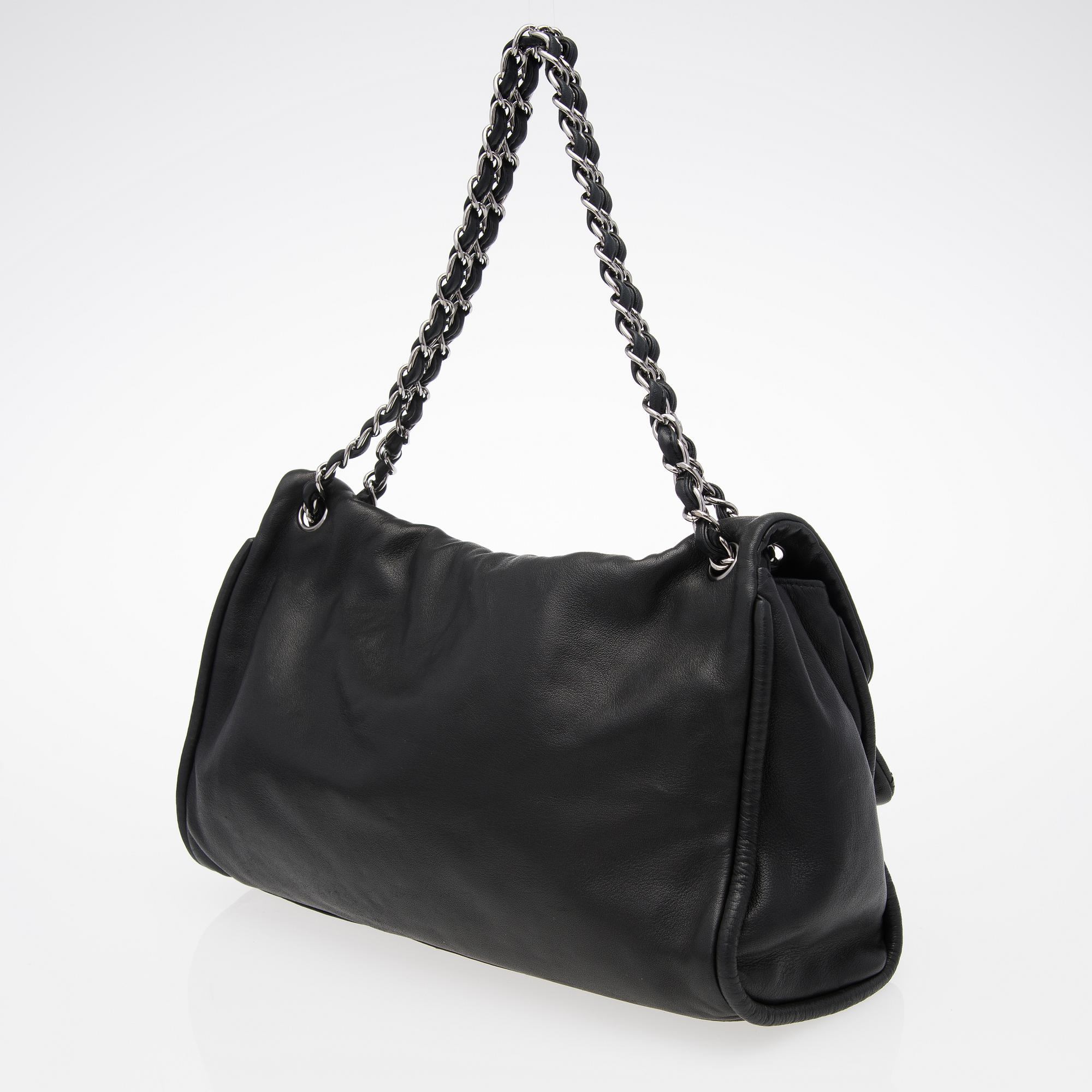 A Black Leather Double Mademoiselle Lock Flap Bag.
