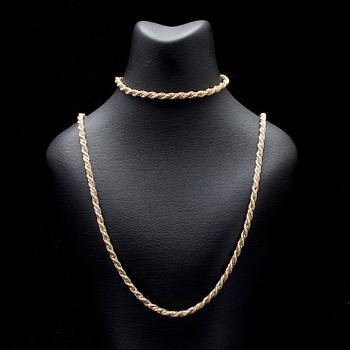 HALS- och ARMKED, tvåfärgsguld 18K, italienska stämplar. Vikt 37,9 g.