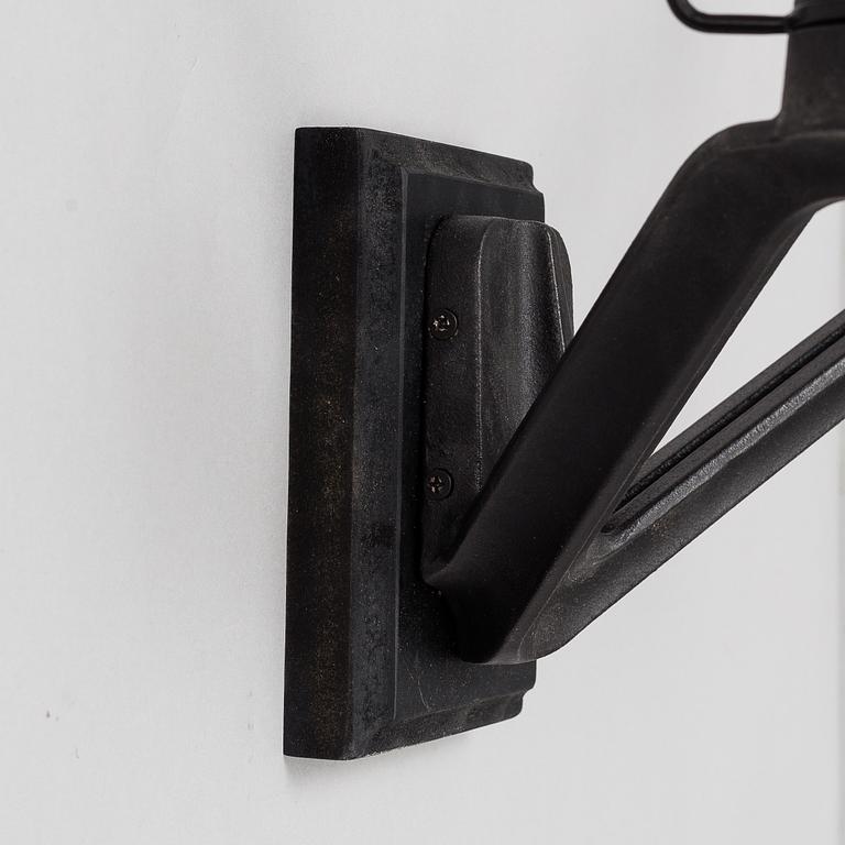 TOM DIXON, a pair of 'Base' wall light.