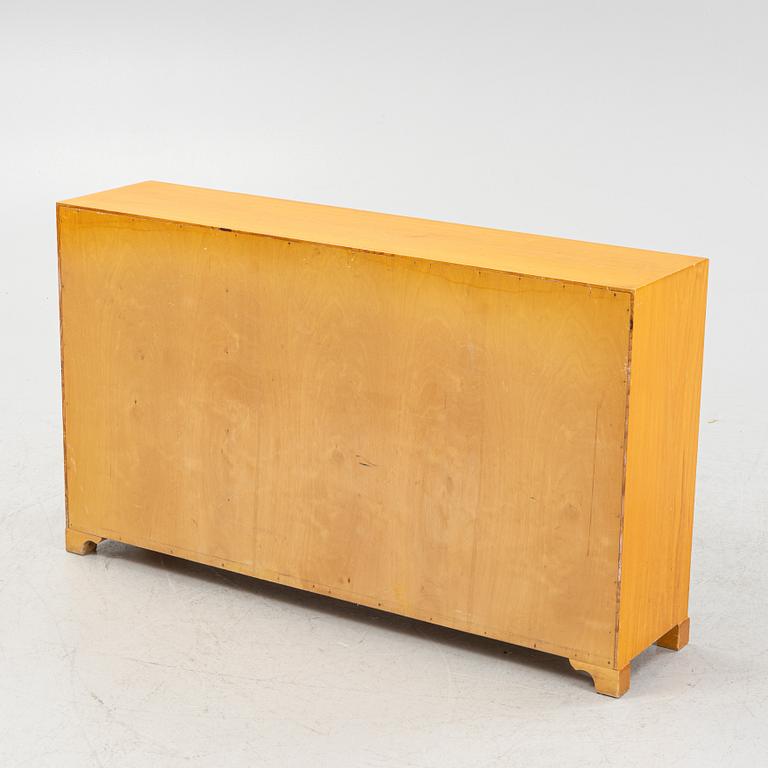 An earlier 20th century book case.
