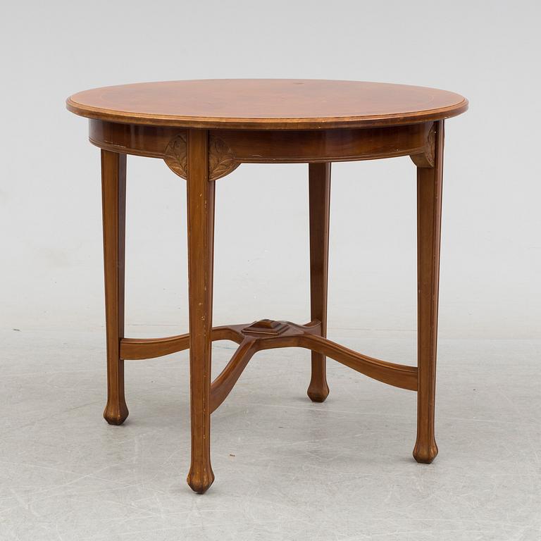 An early 20th century art nouveau table.