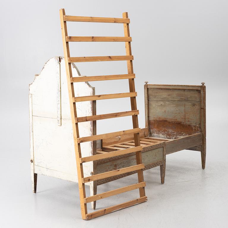 A Gustavian carved bedframe, late 18th century.