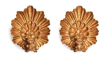 A pair of Matts Eriksson carved and gilt Swedish Grace wall scones, Arvika Sweden.