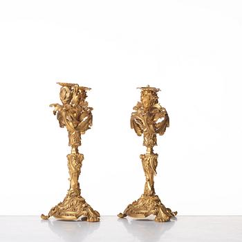 A pair of Neo-Rococo 1840's two-light gilt bronze candelabra.