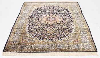 A Ghom, silk rug, c. 162 x 102 cm.