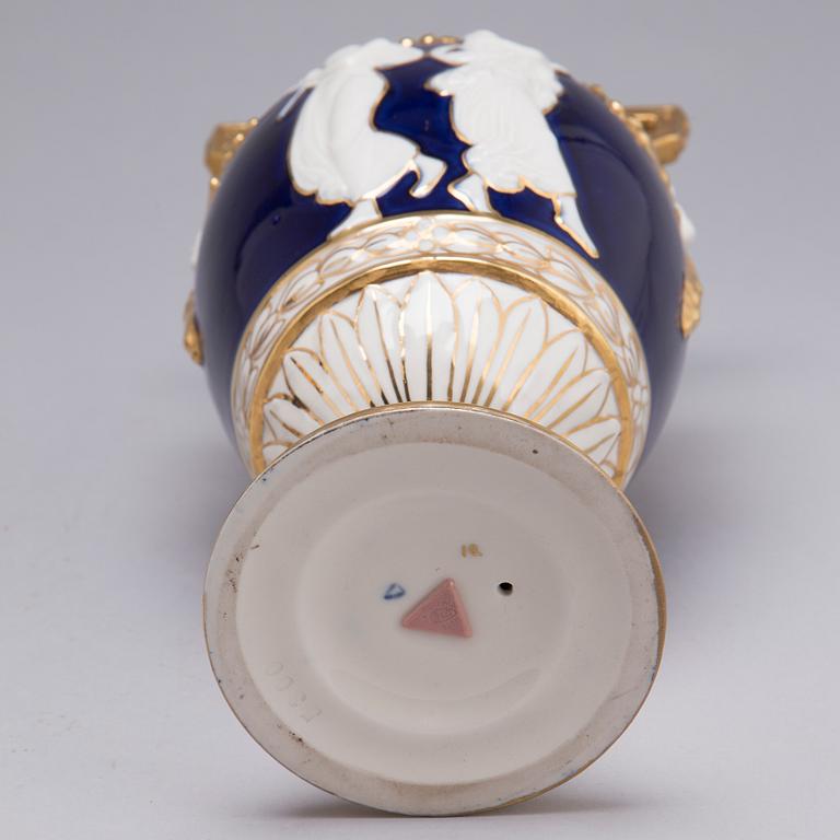 A ROYAL DUX PORCELAIN VASE AND LIDDED URN, 20th century.