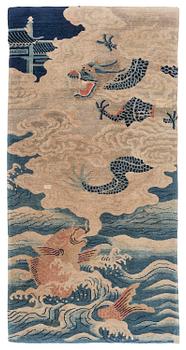 1214. An antique Baotou rug, northern China, late Qing dynasty, circa 1900. c. 178x90 cm.