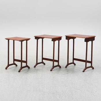A three piece nesting table with inlay, first half of the 20th Century.
