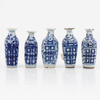 A group of eleven Chinese miniature porcelain vases, late Qing dynasty/around 1900.