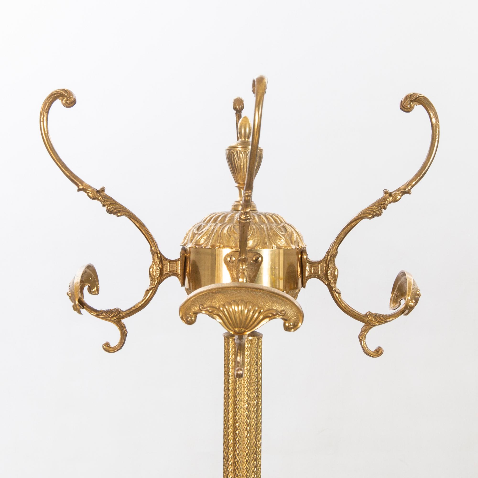 A brass coat hanger alter part of the 20th century.