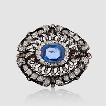 1179. A sapphire and antique-cut diamond brooch, total carat weight circa 3.50 cts. Reworked from necklace-clasp into a brooch.