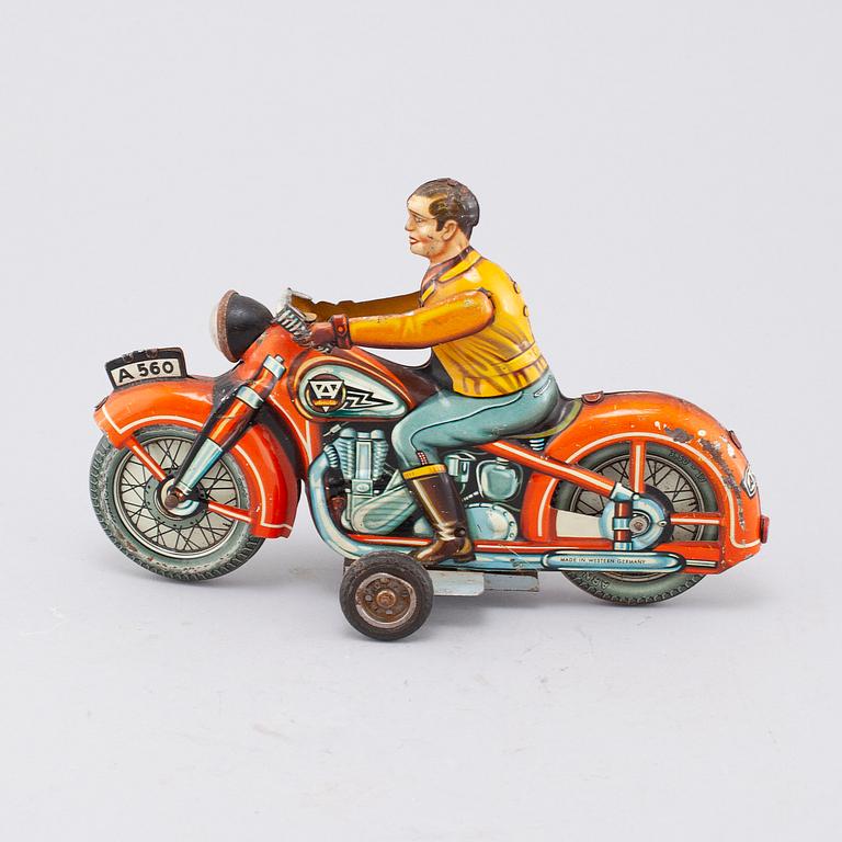 A mid 20th century "Arnold" tin toy.