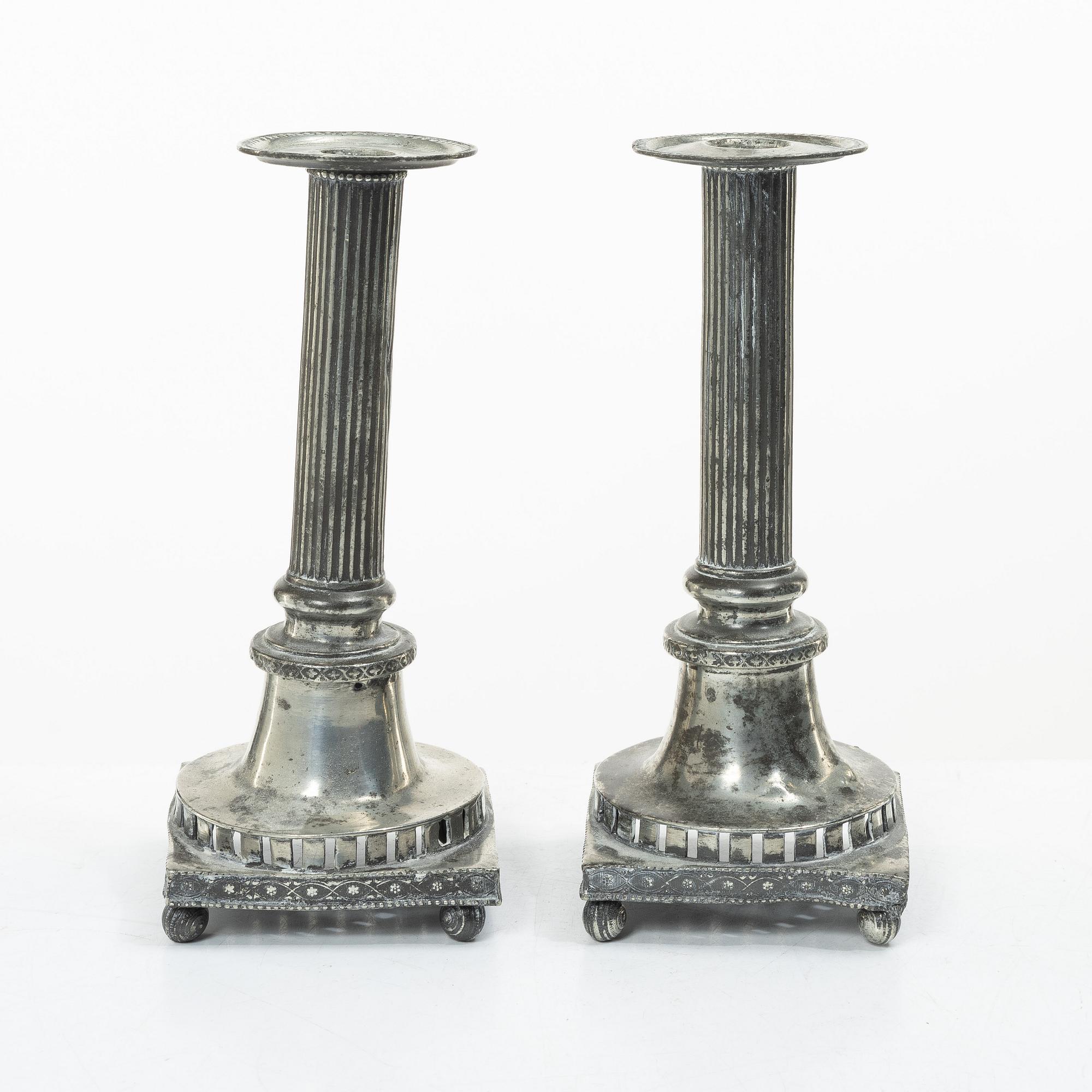 A pair of peuter candlesticks by Hans Wicksten (active between 1782-1810), Västerås.