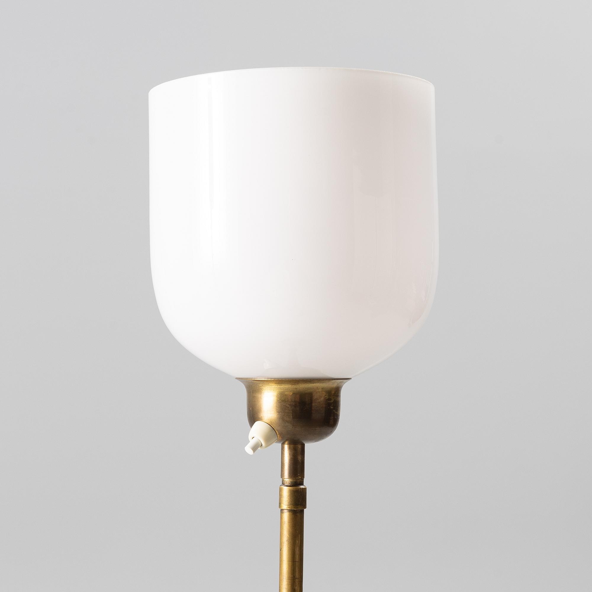 A brass floor lamp, 1940s.