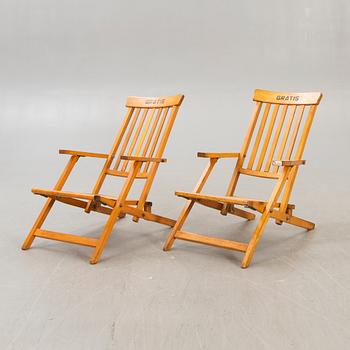 A pair of early 1900s deck chairs.
