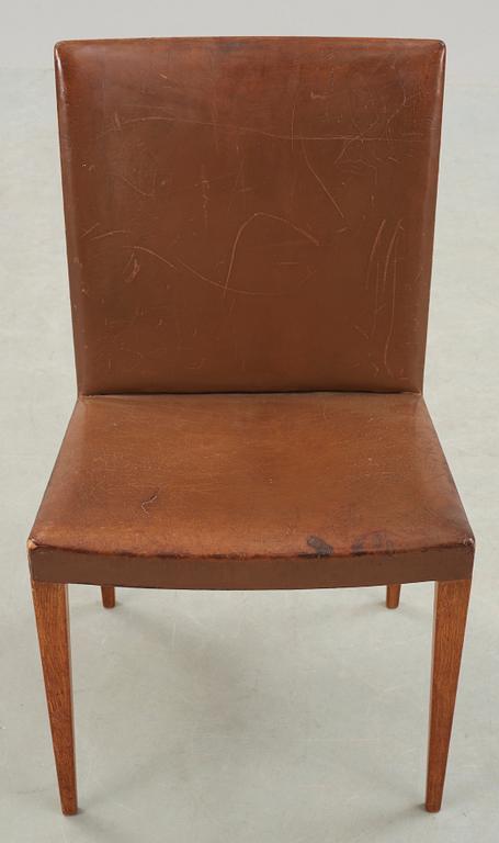 A Bruno Mathsson oak and brown leather chair, Karl Mathsson, Värnamo 1940's.