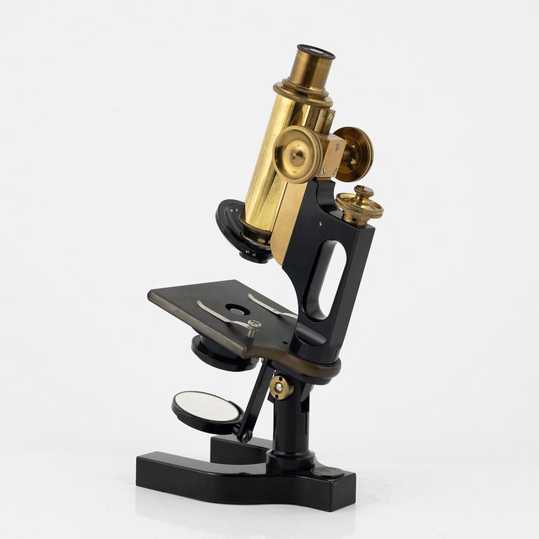 A microscope with accessories, Bausch & Lomb Optical Co. Rochester N.Y, early 20th Century.