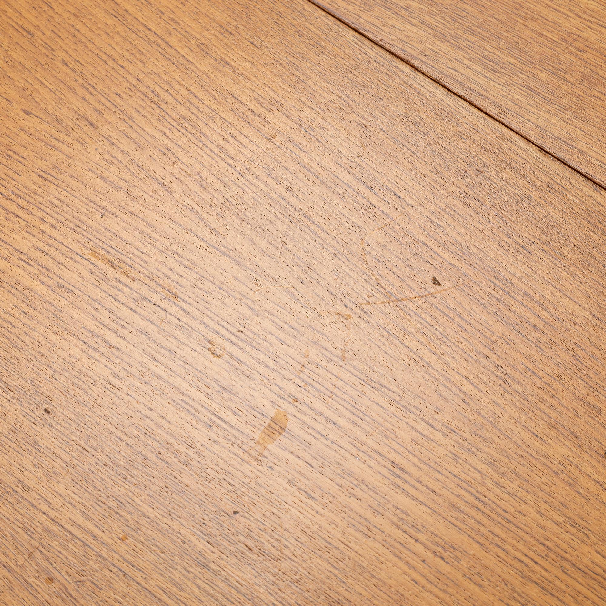 A mid20th century gate-leg table.