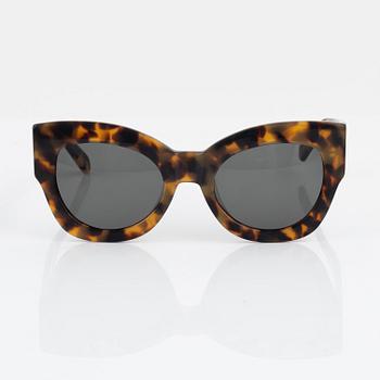 Karen Walker, a pair of tortoise "Northern lights" sunglasses.