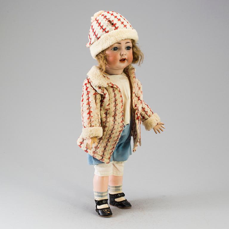 A bisque headed doll, Germany, early 20th century.