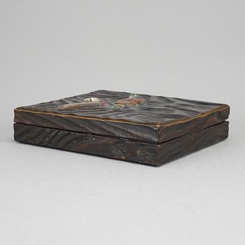 A Japanese lacquered wooden box, Meiji period (1868-1912). Signed inside cover.
