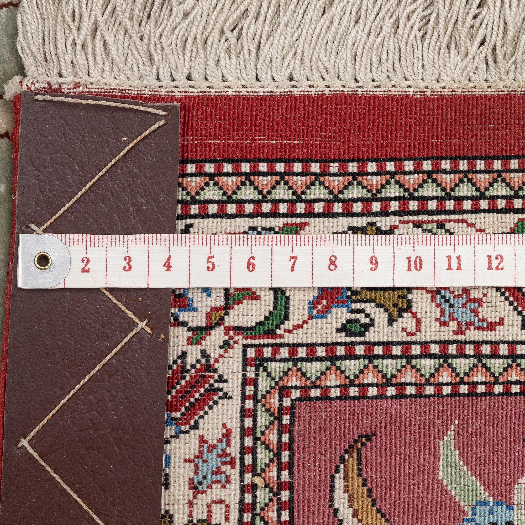 A silk Qum, rug Central Persia (Iran), signerad c. 200 x 135 cm.
