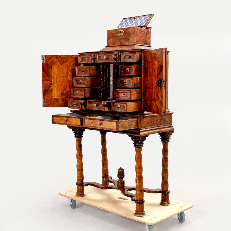 A first half of the 18th century walnut cabinet.