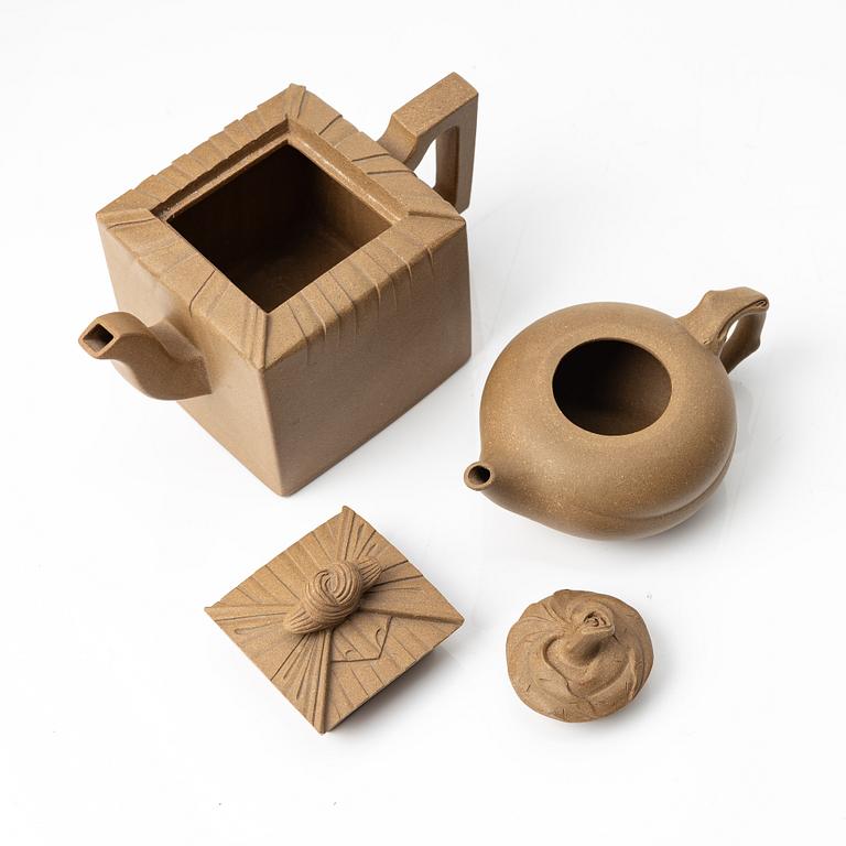 Two yellow yixing teapots, China, 1980/90s.