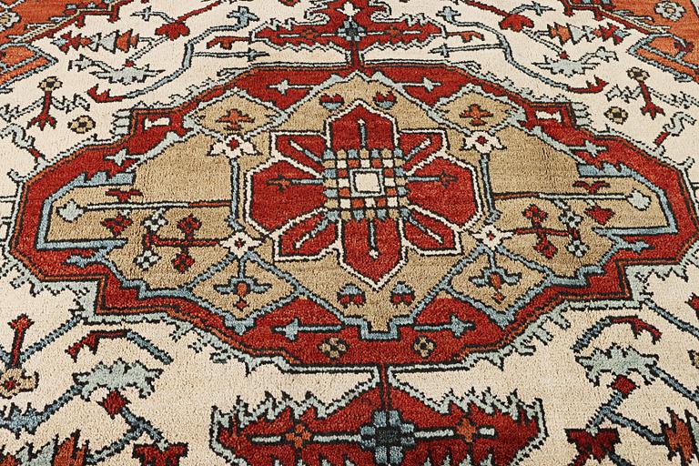 An oriental carpet, c. 296 x 238 cm.